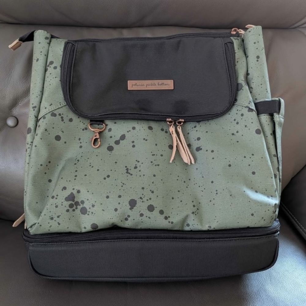 Green and Black Backpack with Splatter Design